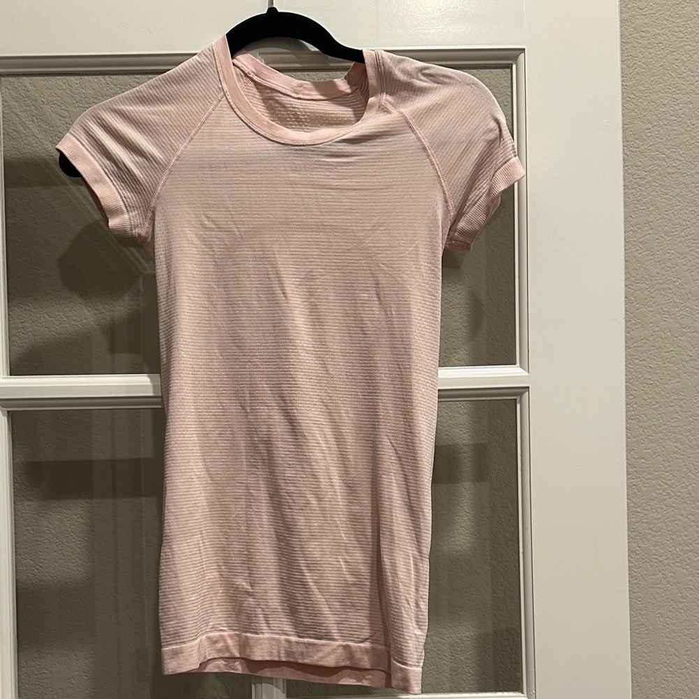 Lululemon women’s swiftly tech tee. Full length, size 2. Light pink